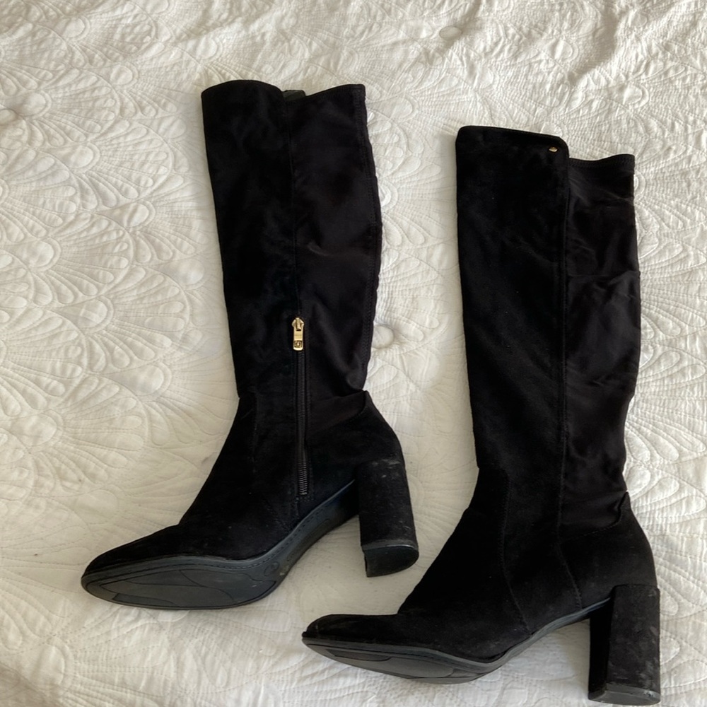 Tall black suede boots